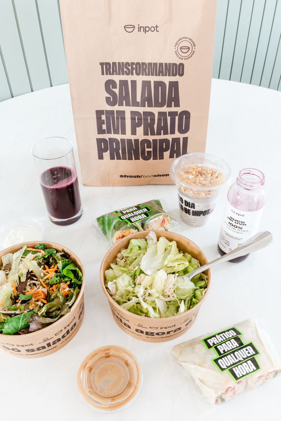 Sacola do Inpot com a frase Transformando salada em prato principal